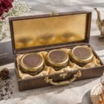 Hill Queen Tea Trio gift box open, satin lining with gold-lid tea jars